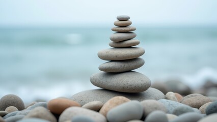 Tranquil Balance: Stacked Stones at Seaside for Mindfulness and Meditation