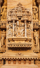 Carved sculpture of Lord Shiva with Parvati on Shri Trinetreshwar Mahadev Temple, Taranetar, Surendranagar, Gujarat, India.