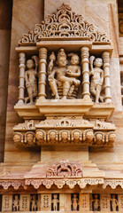Carved sculpture of Lord Vishnu with Goddess Lakshmi, Shri Trinetreshwar Mahadev Temple, Taranetar, Surendranagar, Gujarat, India.