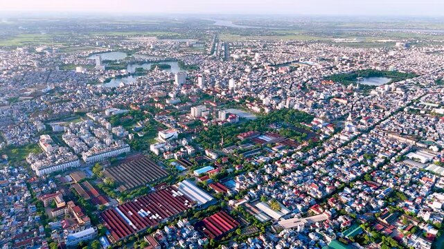 Aerial view of Nam Dinh city with many houses, buildings and lakes