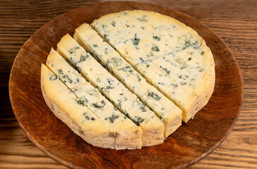 Fourme cheese, stinky french cheese, Fourme d'Ambert gourmet food, semi-hard blue cheese