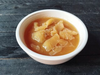 Kolak singkong or sweet cassava soup with palm sugar. Indonesian traditional foods famous in Java 