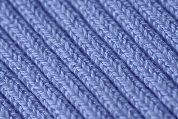 light violet crocheted fabric as a background, texture of pink fabric