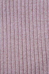 pale purple crocheted fabric as background, texture of pale purple knitted crocheted fabric as background 