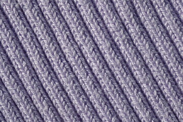pale purple crocheted fabric as background, texture of pale purple knitted crocheted fabric as background 
