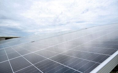 Photovoltaic solar panels are installed on rooftop of building. Regenerative energy system...
