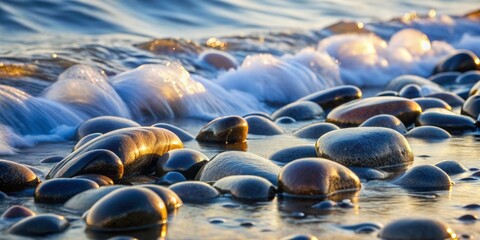 Obraz premium Smooth grey stones glistening with dew and seawater on the shore of a tranquil beach landscape