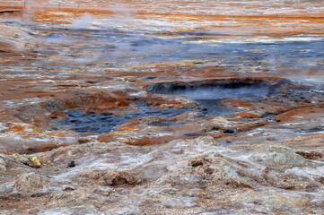 Myvatn Iceland, view across colourful landscape with mud pools and steam vents at Namafjall or Hverir geothermal area 