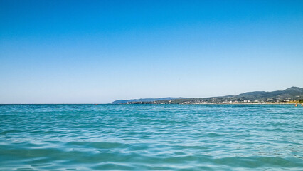 Obraz premium Blue water of Tyrrhenian sea in Vada, Tuscany, Italy.