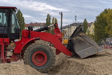 An excavator works on a construction site. © G_T_K_