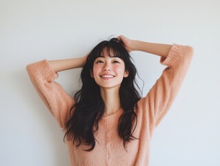 Fototapeta premium Young Japanese Woman Stretching Her Arms