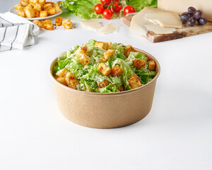 Green salads in the bowl style, white background isolated.
