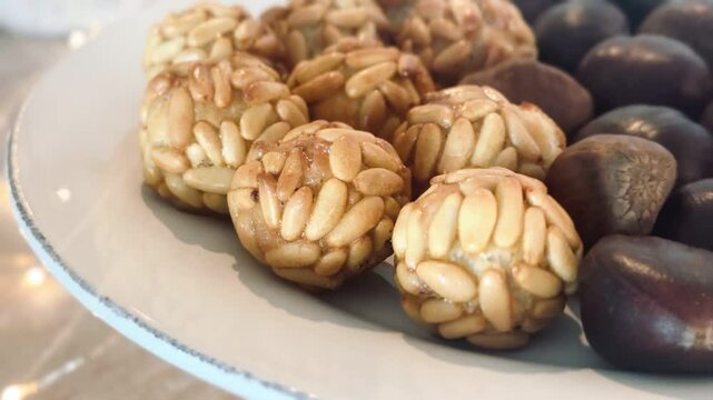 Typical Spanish pastries in Catalonia on All Saints' Day. Freshly baked Panallets on the tray.