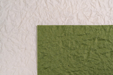 Fototapeta premium Colorful background material of green and white Japanese paper