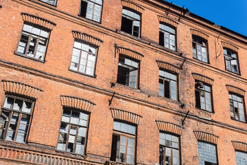 Fototapeta premium industrial background, wall of abandoned vintage factory building