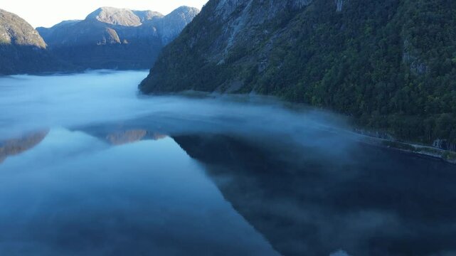 Zooming out drone footage of Hardanger fjord in Norway. Drone footage