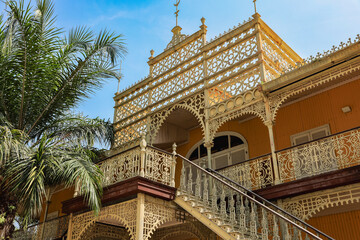 Beautiful colonial architecture in Luanda Angola showcasing intricate ironwork and vibrant colors...