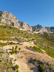 Rocky Mountain range with mountain road in the Adriatic Coast, Dalmatia, Croatia 