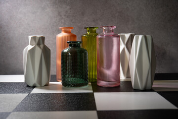 coloured glass and ceramic vases