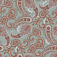 Colorful Paisley wallpaper. Vector Indonesian batik. Bright classic indian fabric. Paisley wallpaper. Ethnic background with paisley and stylized flowers. For textile, cover, wrapping paper, fabric