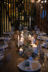 Christmas Table Setting. Holiday Decorations. New Year Celebration. Table served for Christmas dinner