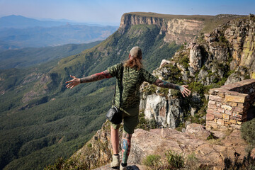Lubango, Angola - May 17, 2024: Tourist enjoying breathtaking views from a mountain peak in Angola...