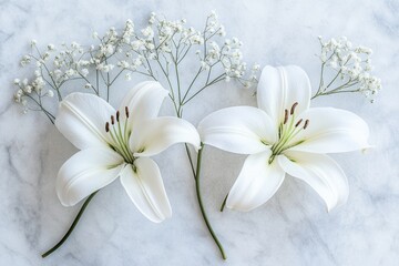 White lilies and baby&rsquo;s breath on marble background with soft, serene aesthetic.