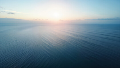 Fototapeta premium Stunning ocean sunset over calm waters