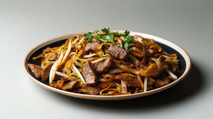 A front view of a plate of stirfried beef chow fun, with wide rice noodles, tender beef slices, and bean sprouts