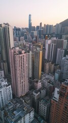 Fototapeta premium Hong kong skyline showing dense buildings at sunset