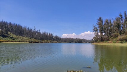 A beautiful landscape image of Lake Sandynulla, a lake in the hill station Ooty, Tamil Nadu, India