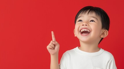 Asian boy pointing finger 