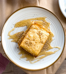 Fried Greek cheese with honey and sesame seeds