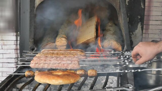 shashlik and lula kebab are fried on the grill