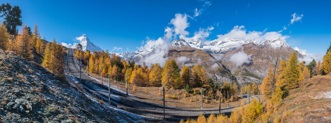 Zermatt Switzerland panorama nature landscape of Matterhorn mountain peak and Gornergrat bahn train...