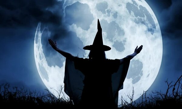 Witch flying on a broom against the moonlit sky, creating a striking silhouette