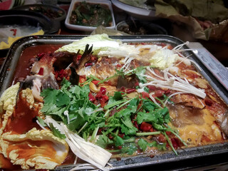 fish baked with vegetables cabbage and peppers and mushrooms