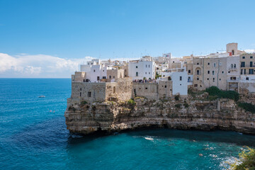 Exploring the coastal charm of Polignano a Mare in Puglia, Italy on a sunny day