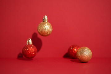 Red scene with sparkling red and golden ornaments. Christmas premium podium for advertising and presentation your product. Showcase, display case.