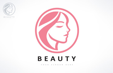 Woman face and hair logo. Beauty saloon design