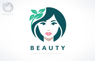 Woman face and hair logo. Beauty saloon design