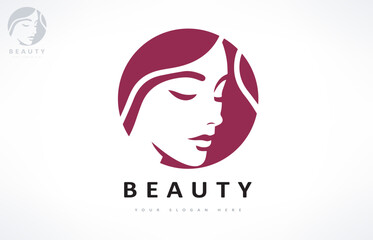 Woman face and hair logo. Beauty saloon design