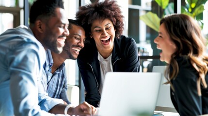 Group of people are laughing and smiling at a laptop