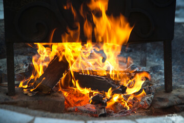 A pile of firewood that was burning fiercely.