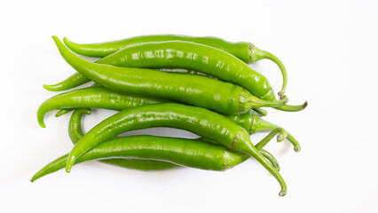 Ripe fruits of green peppers isolated on white background