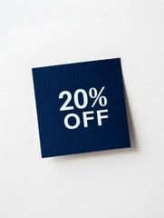 White '20% OFF' Text on a Navy Blue Square Paper Note. White Background 