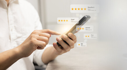 close up young man and hold smartphone and read review online website page about service and...