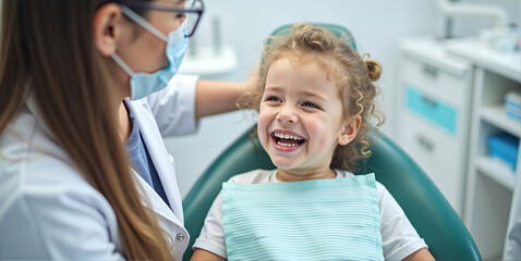 Fototapeta premium Child at the dentist, checking the health of the oral cavity in children and maintaining dental health