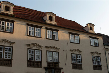 A truly stunning historic building that features elegant architecture and intricately designed window displays