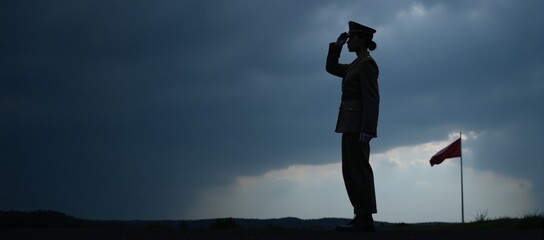 African-American female solider salutes U